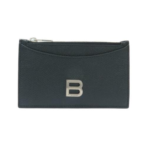 Authentic BALENCIAGA coin case 637371 1IZHY: This item qualifies for FREE DOMESTIC SHIPPING to customers in the USA Brand: Balenciaga Material: Calf Type: Coin Purse Size: W X H : 13.5Cm X 8Cm Color: 1000/Black / Silver Metal Parts Mpn: 637371 1