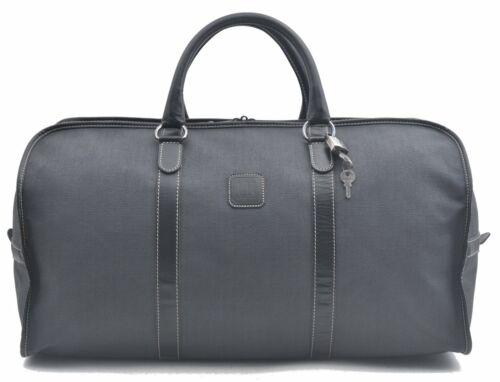 Authentic Dunhill PVC Leather Boston Bag Gray: This item qualifies for FREE DOMESTIC SHIPPING to customers in the USA Brand: Dunhill Style: Boston Bag Country/Region of Manufacture: France Type: Boston Bag Bag Length: 19.7inches (50cm) Department: