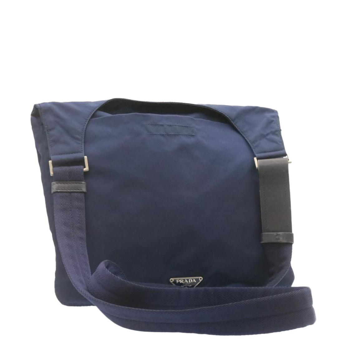 Authentic PRADA Nylon Shoulder Bag Blue: This item qualifies for FREE DOMESTIC SHIPPING to customers in the USA Brand: PRADA Style: Shoulder Bag Material: Nylon Color: Blue Made In: Italy Size (Inches): W11.81 x H10.62 x D2.36inch / Shoulder