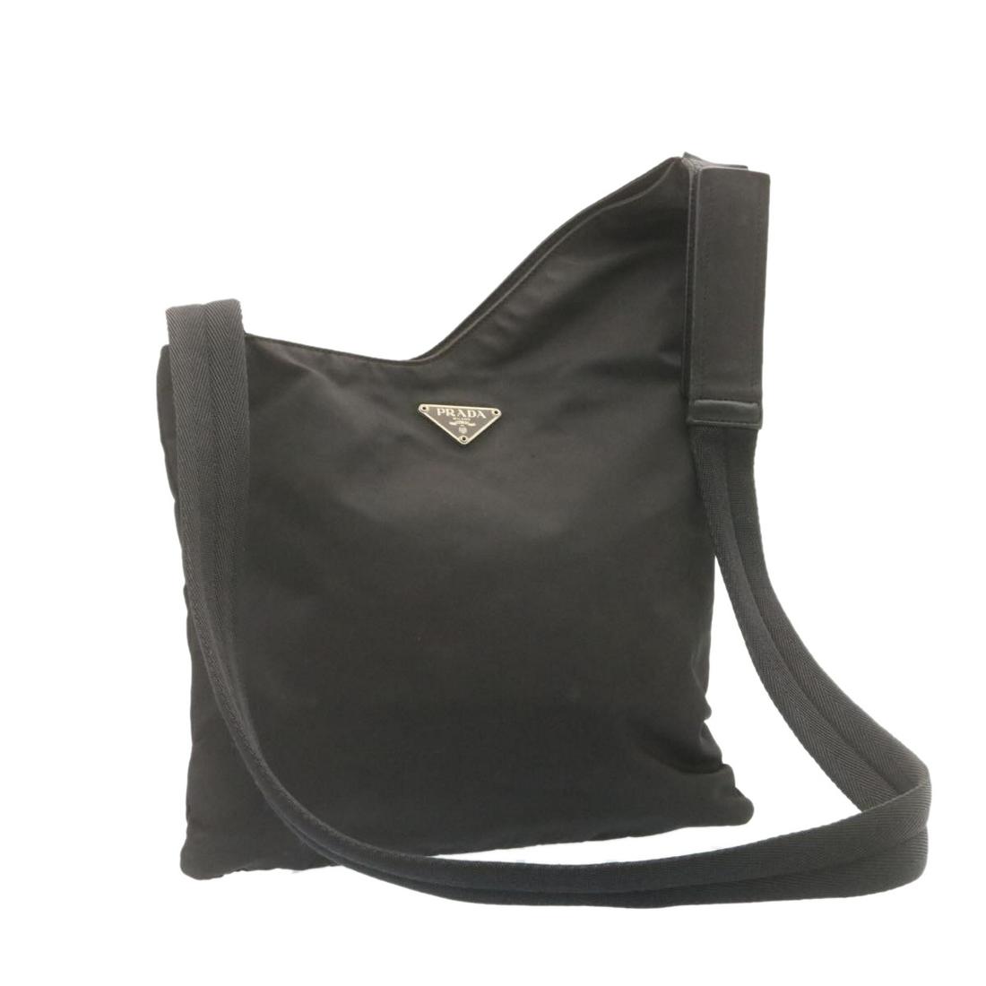 Authentic PRADA Cross Body Shoulder Bag Black Nylon: This item qualifies for FREE DOMESTIC SHIPPING to customers in the USA Brand: PRADA Style: Shoulder Bag Material: Nylon Color: Black Made In: Italy Size (Inches): W10.62 x H9.84inch / Shoulder Drop 19