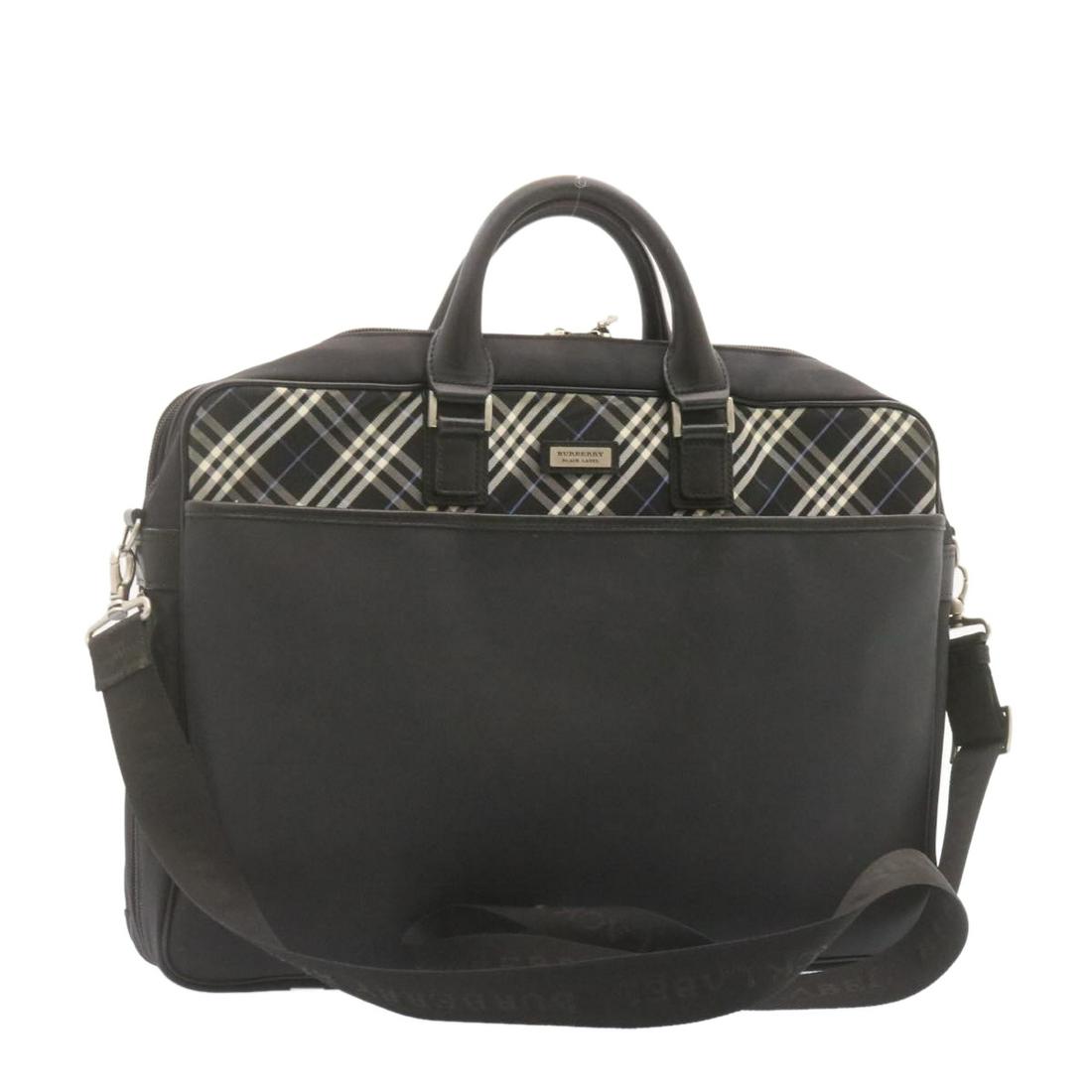 Authentic BURBERRY Black Label 2Way Briefcase Shoulder: This item qualifies for FREE DOMESTIC SHIPPING to customers in the USA Brand: BURBERRY Style: Briefcase Material: Nylon Color: Black Made In: - Size (Inches): W16.5 x H12.2 x D3.9inch (Approx) / Shoul