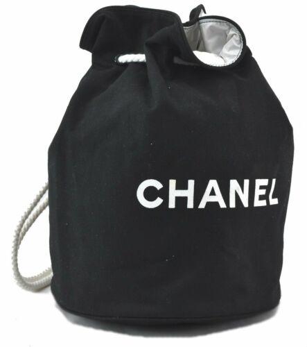 Authentic CHANEL Canvas Pool Shoulder Bag Black CC: This item qualifies for FREE DOMESTIC SHIPPING to customers in the USA Brand: CHANEL Type: Shoulder Bag Bag Length: 11inches (28cm) Department: Women Bag Height: 15.7inches (40cm) Material: Canvas Bag