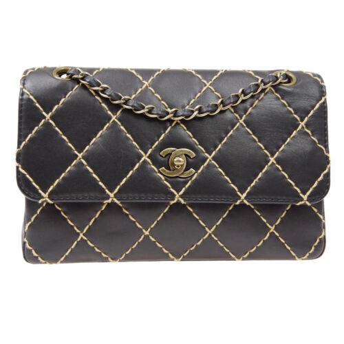 Authentic CHANEL Wild Stitch Classic Single Flap Medium: This item qualifies for FREE DOMESTIC SHIPPING to customers in the USA Size: Medium Pattern: CHANEL Wild Stitch Accents: Quilted Features: Chain Strap Pockets Model: Shoulder Bag Color: Black Country/