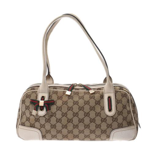 Authentic GUCCI white Hand Bag: This item qualifies for FREE DOMESTIC SHIPPING to customers in the USA Brand: GUCCI Bag Depth: 13cm Style: Hand Bag Bag Length: 33cm Material: GG canvasleather Department: unisex Color: Beige Type: Ha
