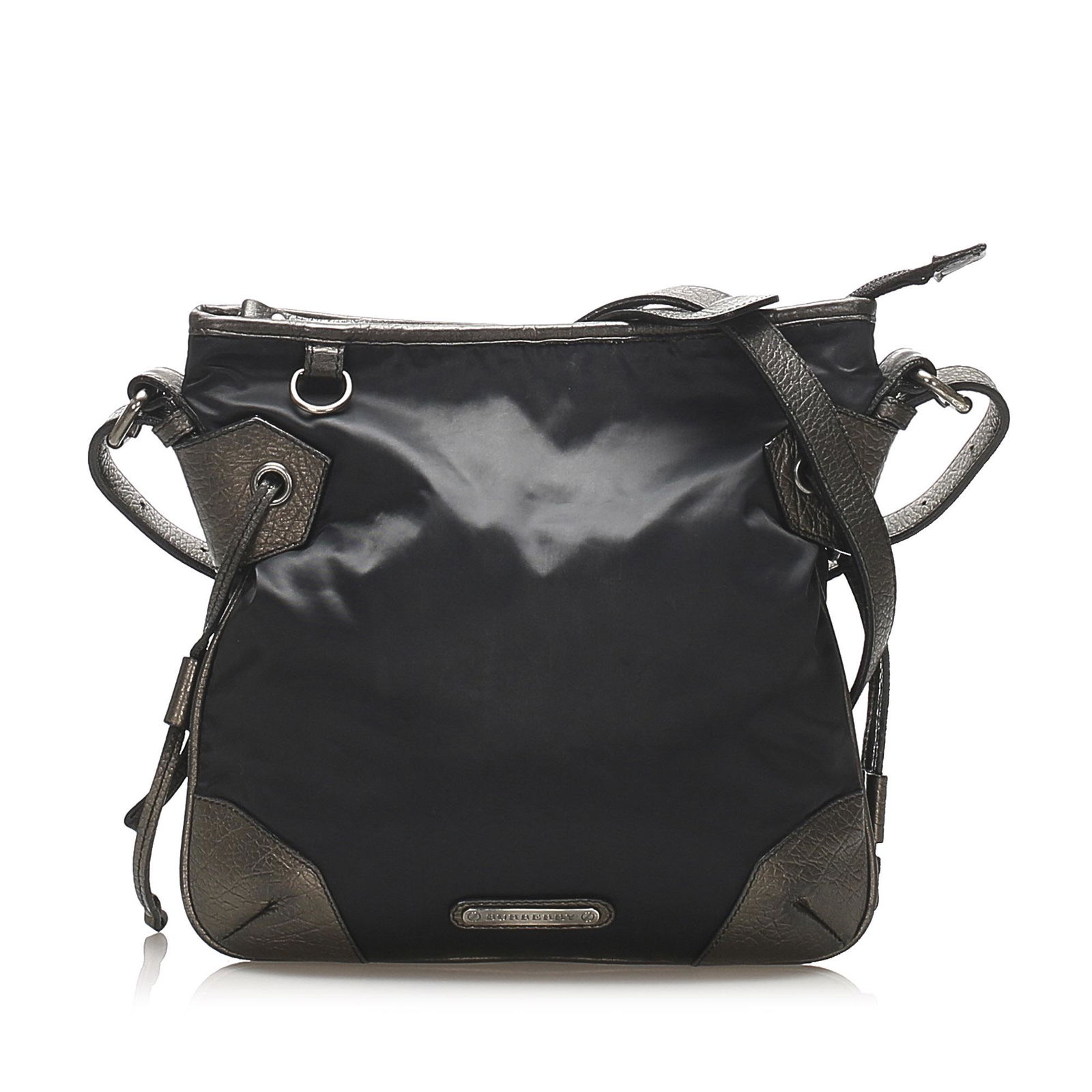 Authentic Burberry Nylon Crossbody Bag: This item qualifies for FREE DOMESTIC SHIPPING to customers in the USA This crossbody bag features a nylon body with leather trim a flat leather strap a top zip closure and side drawstring closures. B