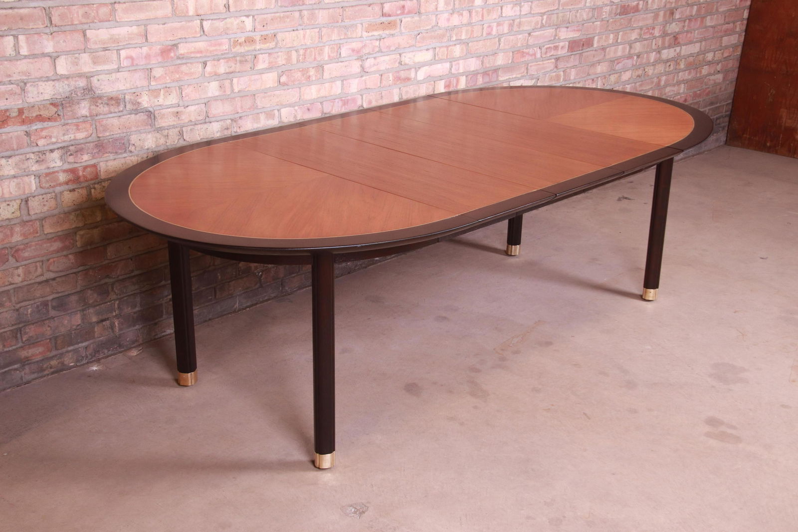 Michael Taylor for Baker Furniture Cherry Wood and: An exceptional mid-century modern Hollywood Regency Chinoiserie extension dining table By Michael Taylor for Baker Furniture "New World Collection" USA 1950s Cherry wood with black lacquered trim and
