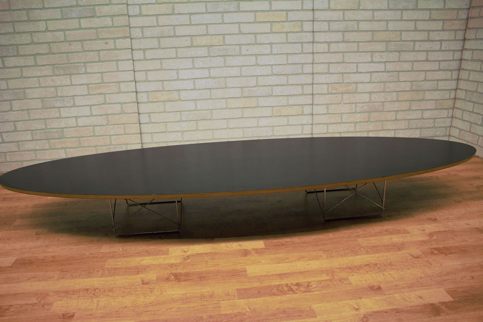 Mid Century Modern Early Charles and Ray Eames: Vintage Mid Century Modern Charles and Ray Eames Surfboard Coffee Table for Herman Miller An Iconic Charles & Ray Eames Classic Modern Design with two attached Brushed Chrome Geometric Wire Bases. Thi