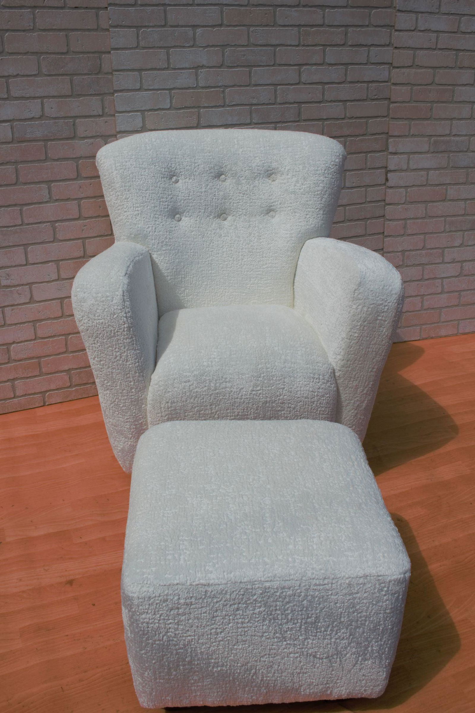 Vintage Scandinavian Modern Flemming Lassen Attributed: Vintage Scandinavian Modern Flemming Lassen Attributed Lounge Armchair and Ottoman Newly Upholstered in a Rich Italian White Sheeps Wool Boucle - 2 Piece Set High-backed vintage armchair in the manner