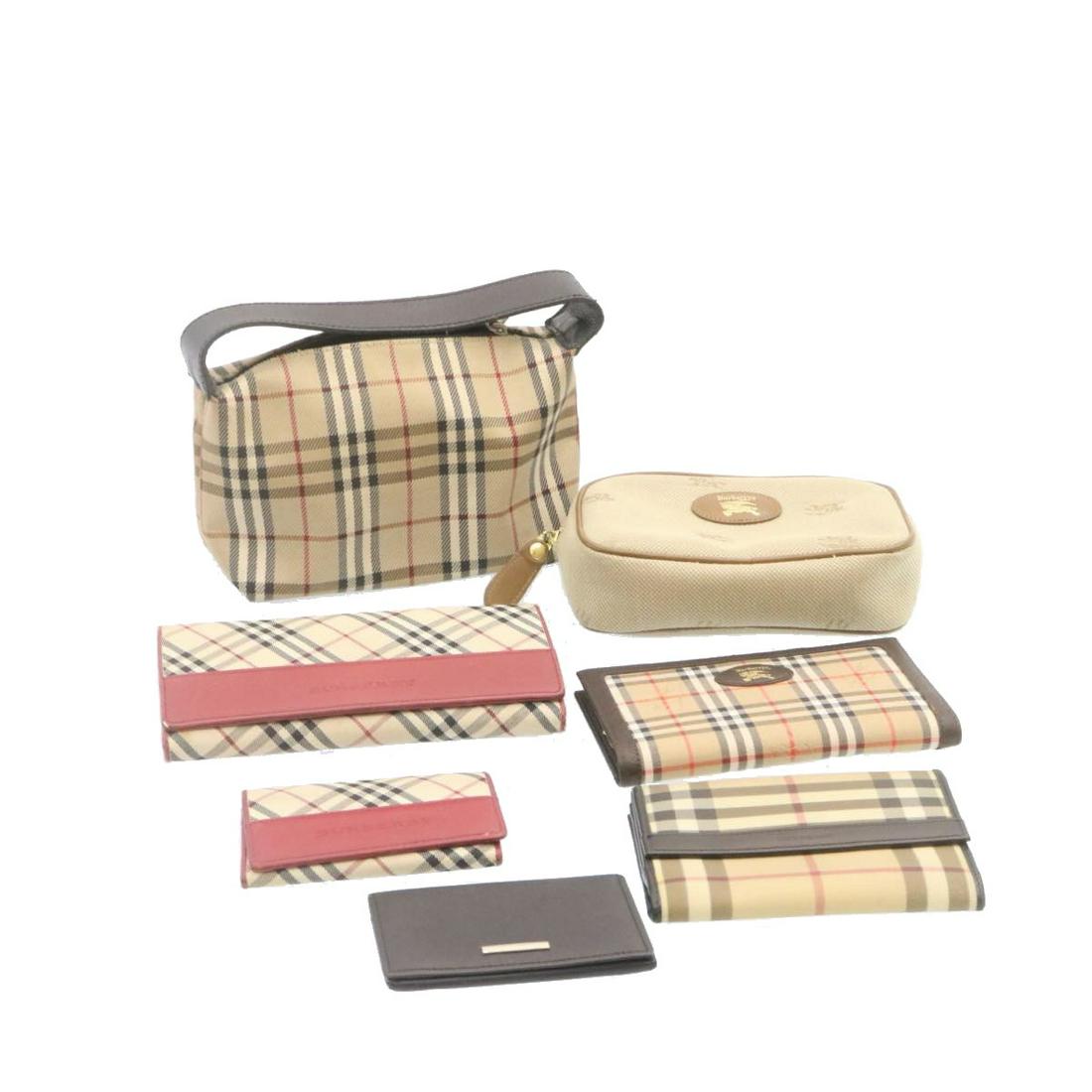 Authentic BURBERRY Nova Check Pouch Wallet 7Set Canvas: This item qualifies for FREE DOMESTIC SHIPPING to customers in the USA Brand: BURBERRY Style: Wallet Material: Canvas Color: Beige Made In: - Size (Inches): Exterior Condition: Surfaceï¼šlose shape