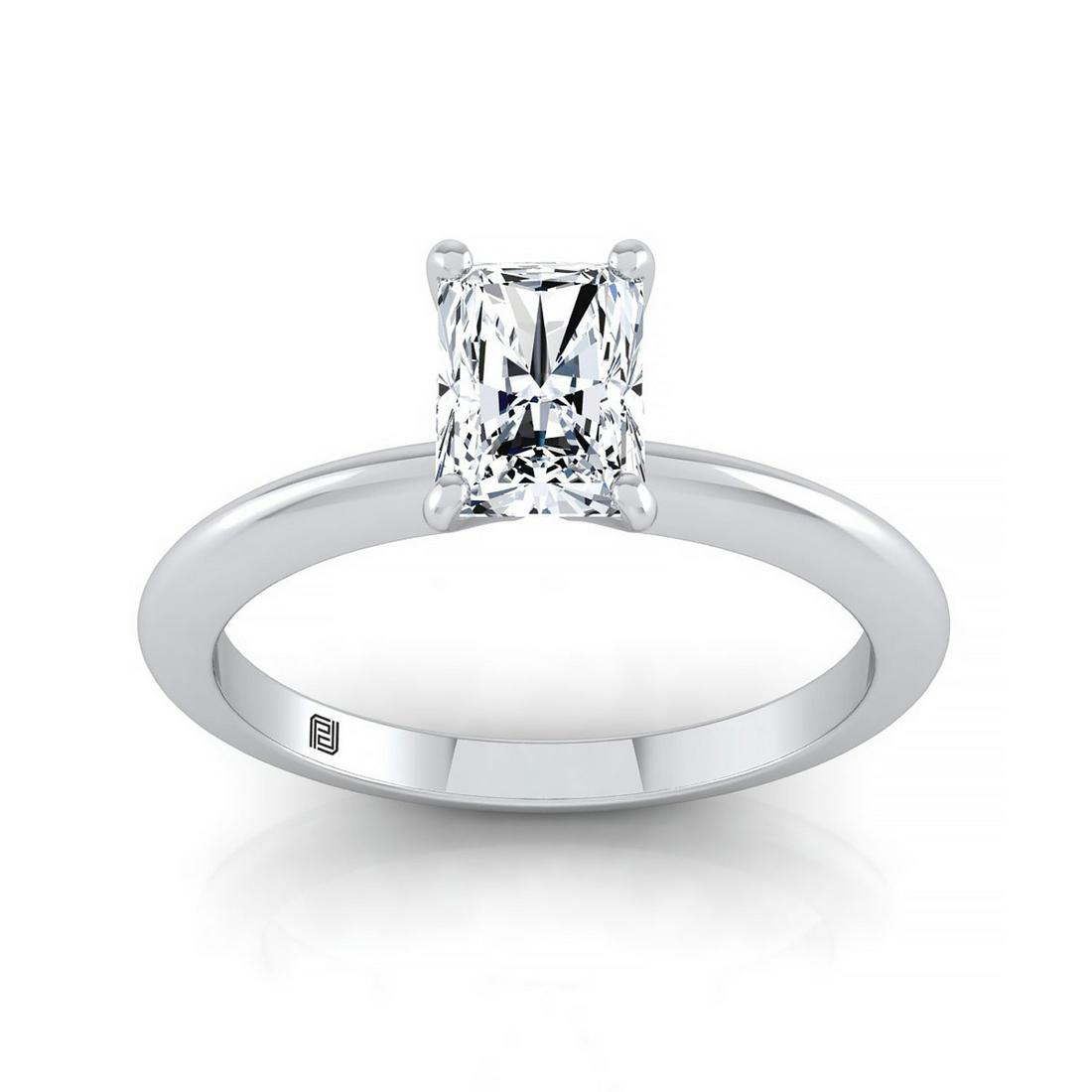 Radiant Cut Diamond Solitaire Engagement Ring With: This item qualifies for FREE DOMESTIC SHIPPING to customers in the USA A Classic Statement Of Style, This Radiant Cut Solitaire Engagement Ring Showcases A Knife Edge Shank And 4 Prong Center Setting 