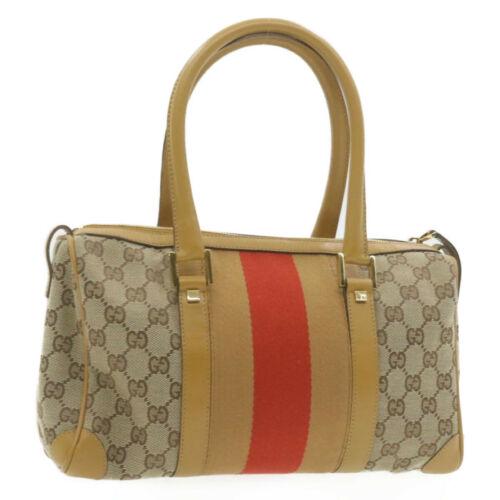 Authentic GUCCI Sherry Line GG Canvas Hand Bag Beige: This item qualifies for FREE DOMESTIC SHIPPING to customers in the USA Brand: GUCCI Size: W30 x H17 x D10cm(Approx) Color: Beige Country/Region of Manufacture: Italy Material: Canvas Type: unknown Sty