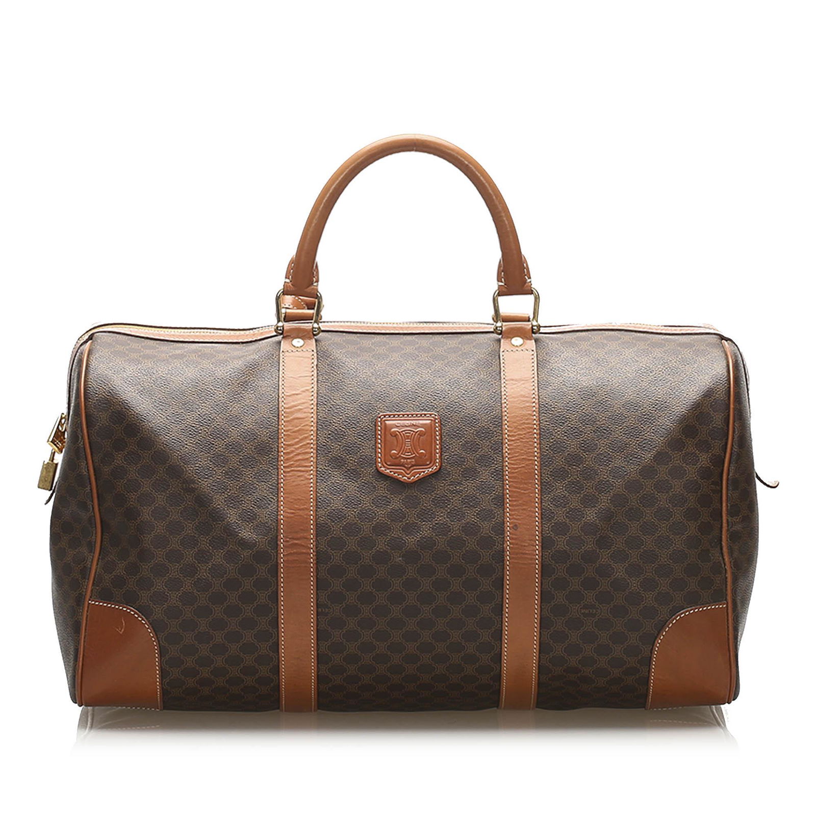 Authentic Celine Macadam Travel Bag: This item qualifies for FREE DOMESTIC SHIPPING to customers in the USA This travel bag features a pvc body with leather trim rolled leather handles a top zip closure and an interior zip pocket. Brand: