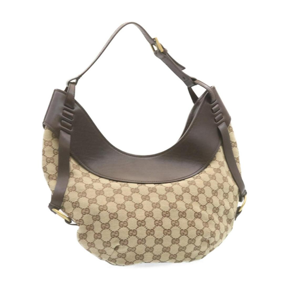 Authentic GUCCI GG Canvas Shoulder Bag Beige Brown LV: This item qualifies for FREE DOMESTIC SHIPPING to customers in the USA Brand: GUCCI Style: - Material: Beige / Brown Color: Italy Made In: 1062501705 Size (Inches): - Exterior Condition: Dust Bag Inte