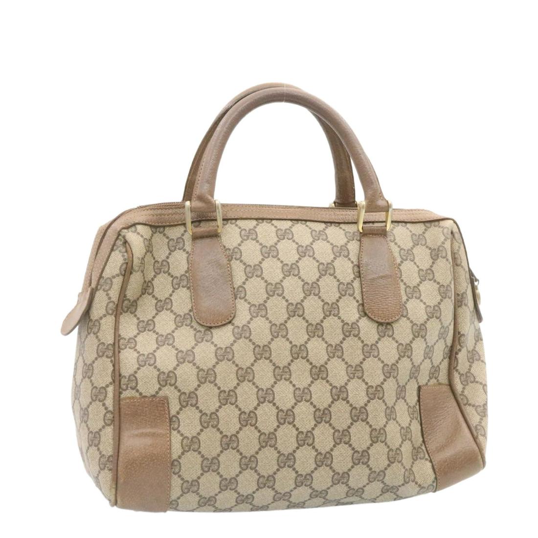 Authentic GUCCI GG Canvas Hand Bag Beige: This item qualifies for FREE DOMESTIC SHIPPING to customers in the USA Brand: GUCCI Style: Hand Bag Material: PVC Leather / GG Canvas Color: Beige Made In: Italy Size (Inches): W11.8 x H8.7 x D4.7inch