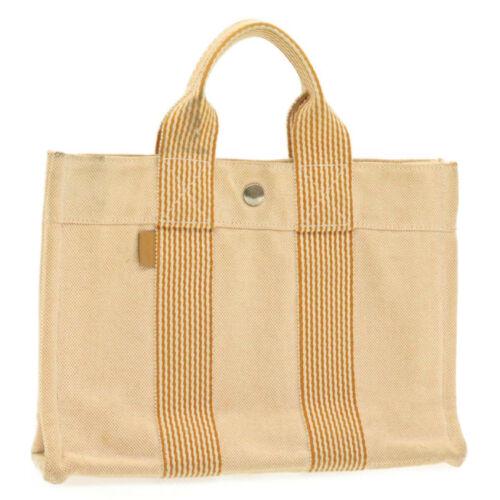 Authentic HERMES Fourre Tout PM Hand Bag Orange Cotton: This item qualifies for FREE DOMESTIC SHIPPING to customers in the USA Brand: HERMES Size: W30 x H22 x D9cm(Approx) Color: Orange Country/Region of Manufacture: France Material: 100% Cotton Type: unkn