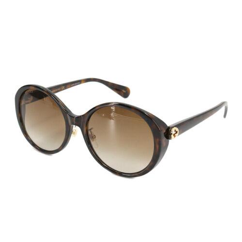 Authentic GUCCI Interlocking G Bumblebee Sunglasses: This item qualifies for FREE DOMESTIC SHIPPING to customers in the USA Brand: Gucci Department: Women Style: Sunglasses Weight: 1.1Oz Color: Havana Engraved: Gg0370Sk The BIDHAUS Guarantee: Photos des