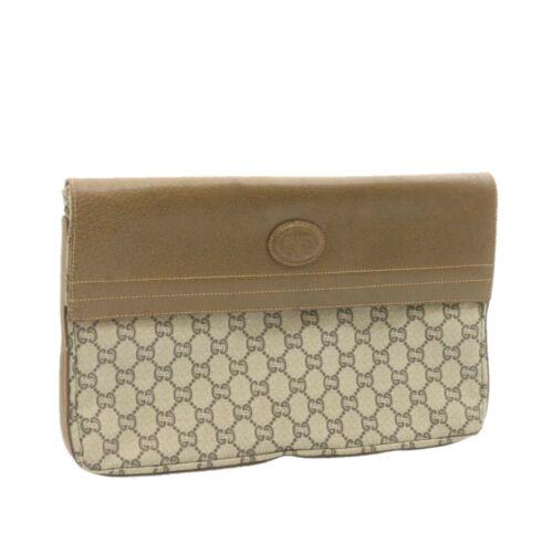 Authentic GUCCI Plus GG Canvas Clutch Bag Beige PVC: This item qualifies for FREE DOMESTIC SHIPPING to customers in the USA Brand: GUCCI Size: W33 x H22 x D3.5cm(Approx) Color: Beige Country/Region of Manufacture: Italy Material: PVC Leather Type: unkno