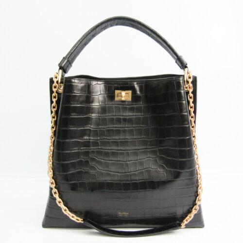 Authentic Max Mara Women's Leather Handbag Shoulder Bag: This item qualifies for FREE DOMESTIC SHIPPING to customers in the USA Brand: Max Mara Closure: Magnetic Snap Turn Lock Material: Leather Occasion: Business Style: Handbag Shoulder Bag Country/Region