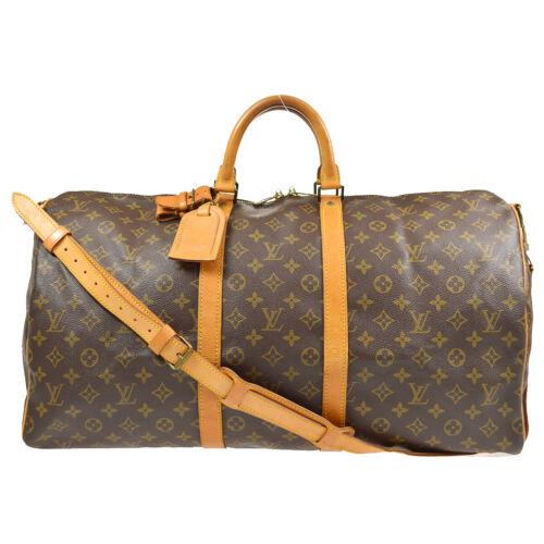 Authentic LOUIS VUITTON KEEPALL 55 BANDOULIERE 2WAY: This item qualifies for FREE DOMESTIC SHIPPING to customers in the USA Size: Extra Large Features: 2Way Bag Monogram Adjustable Strap Detachable Strap Accents: Logo Color: Brown Model: Louis Vuitton K