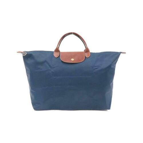 Authentic Longchamp Bag 1624 089: This item qualifies for FREE DOMESTIC SHIPPING to customers in the USA Brand: Longchamp Gender: Unisex Style: Travel Bags Size: W X H X Gusset (W) : 45-58Cm X 35Cm X 23Cm Handle:31Cm Color: 556 Navy G