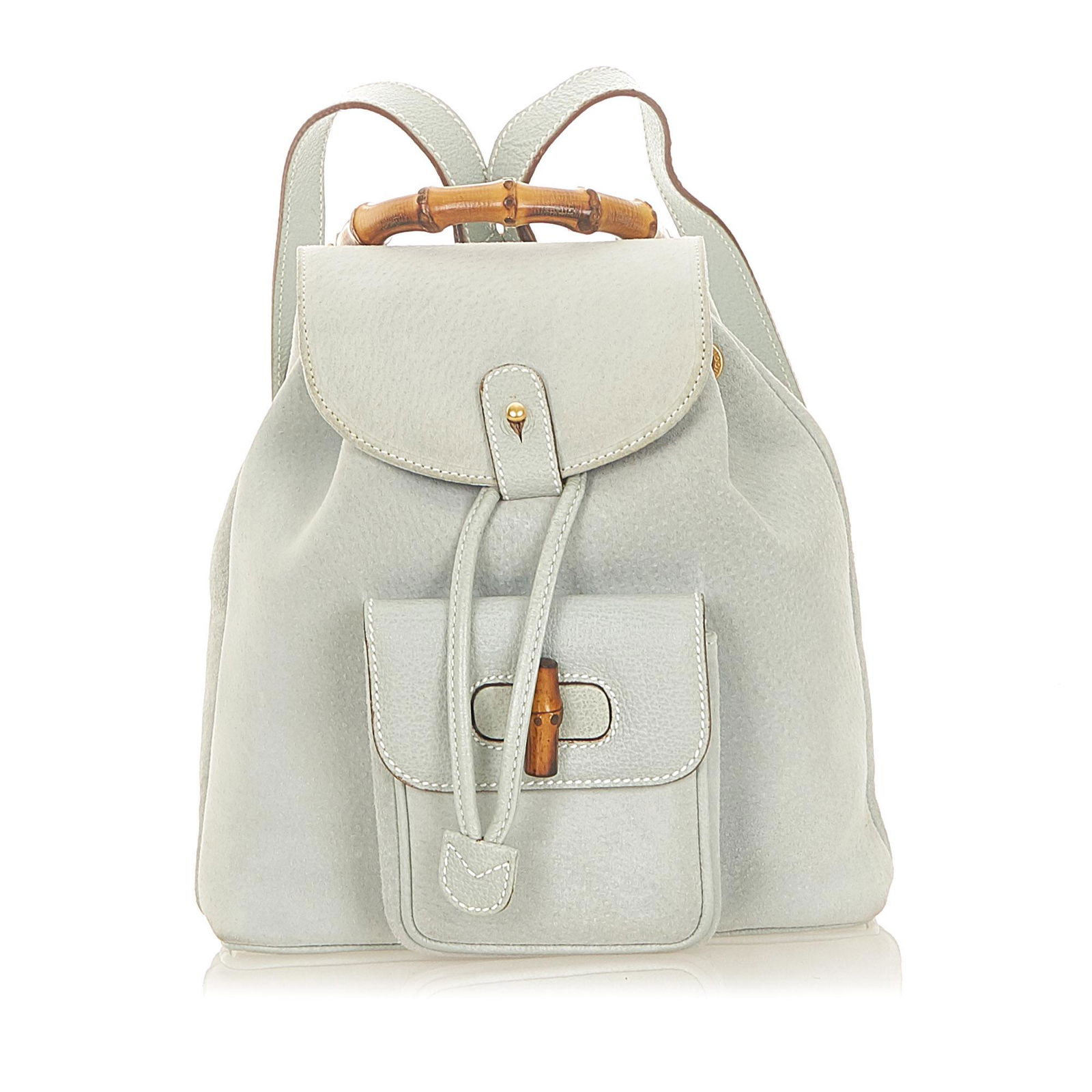 Authentic Gucci Bamboo Suede Backpack: This item qualifies for FREE DOMESTIC SHIPPING to customers in the USA The Bamboo backpack features a suede body with leather trim an exterior front flap pocket with bamboo twist lock closure flat lea