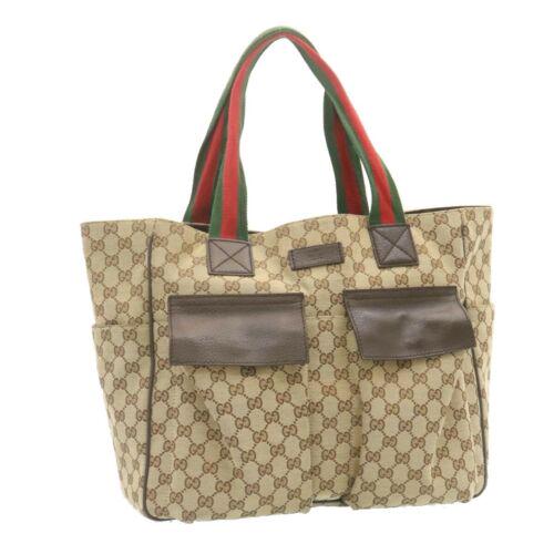 Authentic GUCCI Sherry Line GG Canvas Tote Bag Beige: This item qualifies for FREE DOMESTIC SHIPPING to customers in the USA Brand: GUCCI Color: Beige / Red / Green Material: GG Canvas Country/Region of Manufacture: Italy UPC: Does not apply EAN: Does no