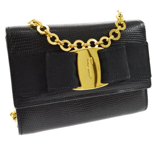 Authentic Salvatore Ferragamo Vara Bow Chain Shoulder: This item qualifies for FREE DOMESTIC SHIPPING to customers in the USA Size: Small Pattern: Vara Bow Accents: Bow Logo Features: Chain Strap Detachable Strap Inner Pockets Model: Salvatore Ferragamo V