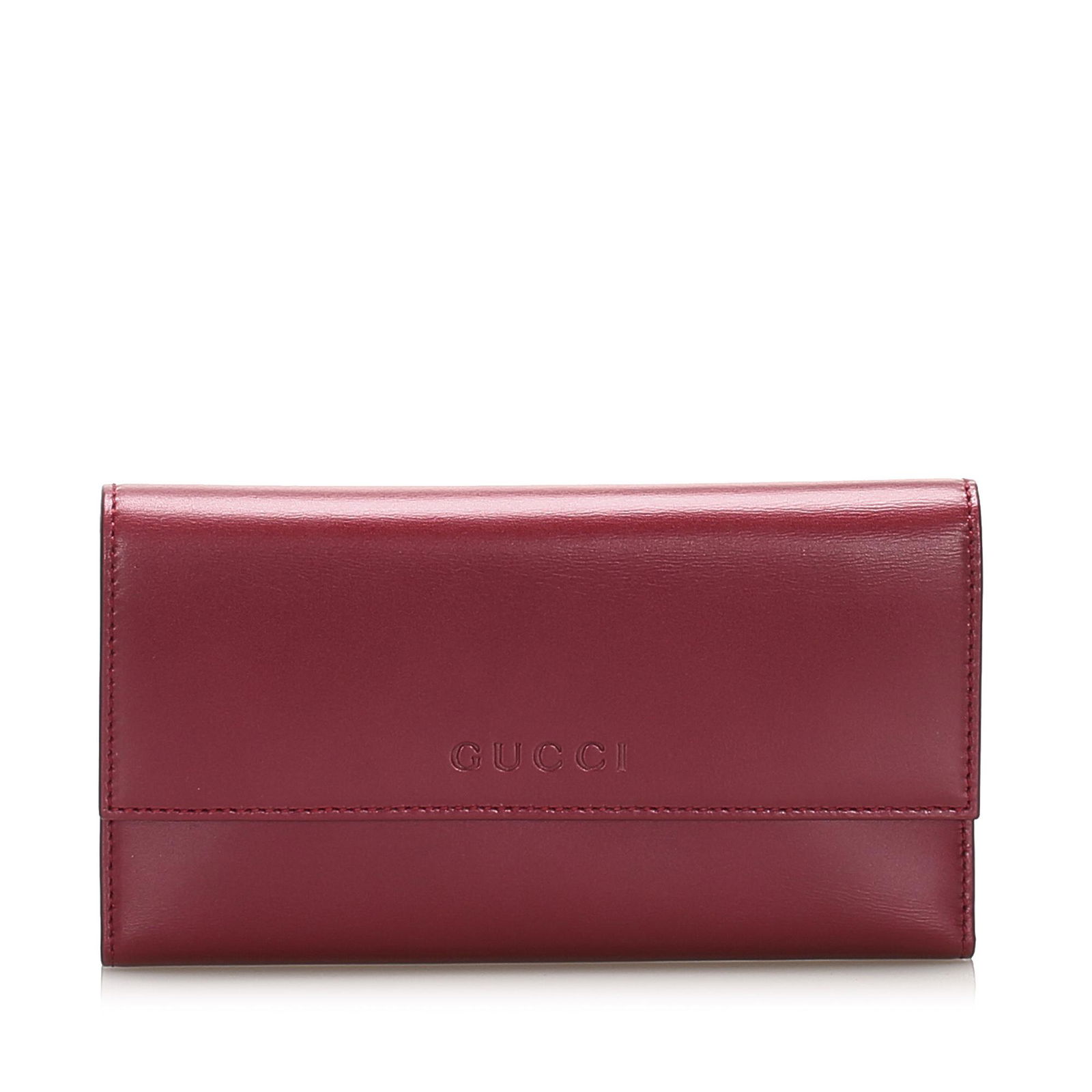 Authentic Gucci Leather Long Wallet: This item qualifies for FREE DOMESTIC SHIPPING to customers in the USA This long wallet features a leather body a top flap with a snap closure and an interior zip and slip compartments. Brand: Gucci M