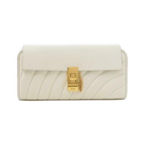 Authentic Chloe Wallet CHC18UP781 A04: This item qualifies for FREE DOMESTIC SHIPPING to customers in the USA Brand: Chloe Material: Leather Type: Purse Size: W X H X Gusset (W) : 19.5Cm X 9.5Cm X 2.5Cm Color: 119/Natural White / Gold Part