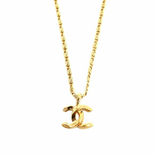 Authentic CHANEL Coco Logos Necklace Gold 1982 Vintage: This item qualifies for FREE DOMESTIC SHIPPING to customers in the USA Brand: Chanel Weight: 0.13Oz Style: Necklace Engraved: 1982 Color: Gold Type: Necklace Country: France Frame Color: - The BIDHAUS