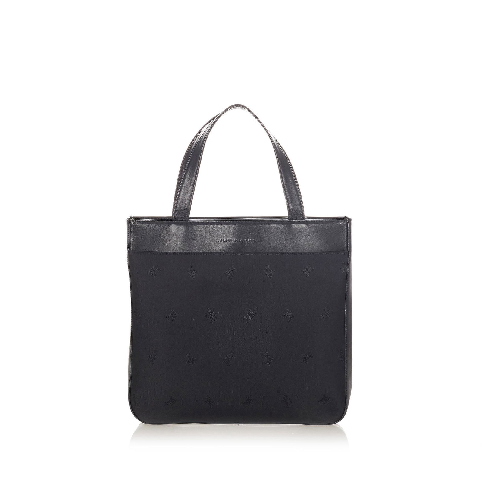 Authentic Burberry Canvas Handbag: This item qualifies for FREE DOMESTIC SHIPPING to customers in the USA This handbag features a canvas body with leather trim flat leather handles an open top and interior zip and slip pockets. Brand: