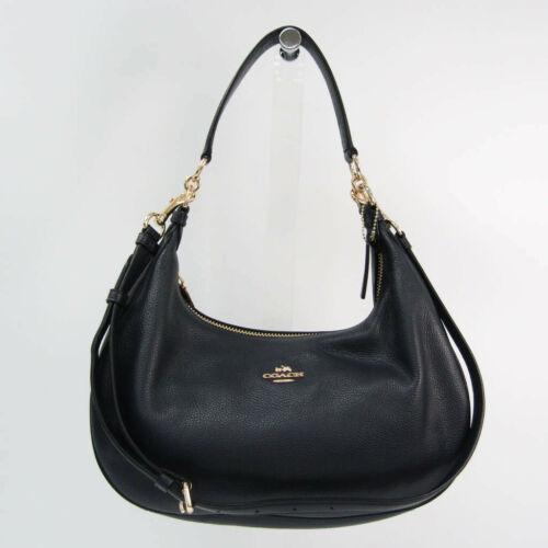 Authentic Coach Signature Harley EW Hobo F38250 Women's: This item qualifies for FREE DOMESTIC SHIPPING to customers in the USA Brand: Coach Occasion: Business Material: Leather Country/Region Of Manufacture: Vietnam Style: Handbag Shoulder Bag Personalize:
