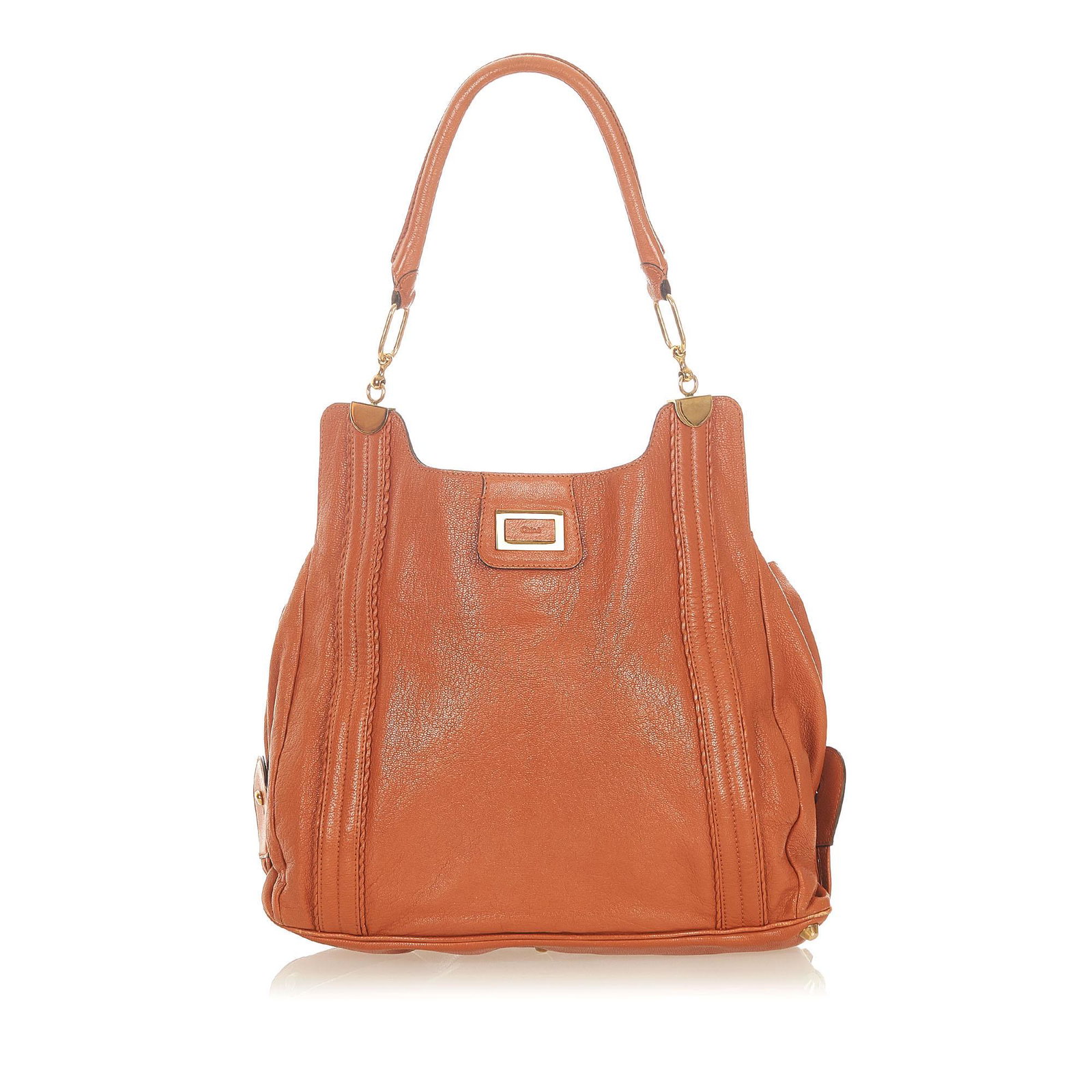 Authentic Chloe Irene Leather Shoulder Bag: This item qualifies for FREE DOMESTIC SHIPPING to customers in the USA The Irene features a leather body rolled handles a top magnetic closure an interior zip compartment and interior slip pocket. Bra