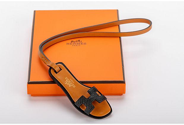 Authentic Hermes Rare Oran Black Bag Charm BNIB: This item qualifies for FREE DOMESTIC SHIPPING to customers in the USA Condition: New Era: Contemporary; 2000s Dimensions: 2.8" L x 1.1" W x 0.3" H Materials: letaher Color: black gold Hermes collecti
