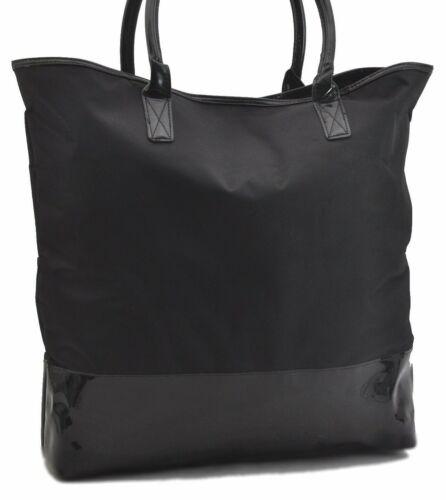 Authentic Burberrys Tote Bag Nylon Enamel Black: This item qualifies for FREE DOMESTIC SHIPPING to customers in the USA Brand: Burberrys Bag Height: 16.9inches (43cm) Material: Nylon Bag Depth: 3.1inches (8cm) Style: Tote Bag MPN: Does not apply Col