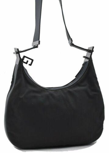 Authentic GUCCI Shoulder Cross Body Bag Nylon Leather: This item qualifies for FREE DOMESTIC SHIPPING to customers in the USA Brand: GUCCI Style: Shoulder Bag Country/Region of Manufacture: Italy Type: Shoulder Bag Serial Number: 00133151705 Department: W