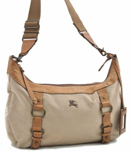 Authentic BURBERRY BLUE LABEL Shoulder Cross Body Bag: This item qualifies for FREE DOMESTIC SHIPPING to customers in the USA Brand: Burberry Style: Shoulder Bag Country/Region of Manufacture: Japan Type: Shoulder Bag Bag Length: 15inches (38cm) Departmen