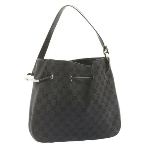 Authentic GUCCI GG Canvas Shoulder Bag Black: This item qualifies for FREE DOMESTIC SHIPPING to customers in the USA Brand: GUCCI Bag Length: 11.4inch(Approx) / 29cm(Approx) Style: Shoulder Bag Department: Women Material: GG Canvas Country of Man