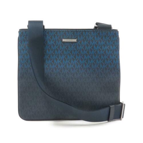Authentic MICHAEL Michael Kors Bag 33S8LMNC2V: This item qualifies for FREE DOMESTIC SHIPPING to customers in the USA Brand: Michael Michael Kors Style: Shoulder Bag Color: Navy Silver Metal Parts Material: Coating Canvas Gender: Mens Size: W X H