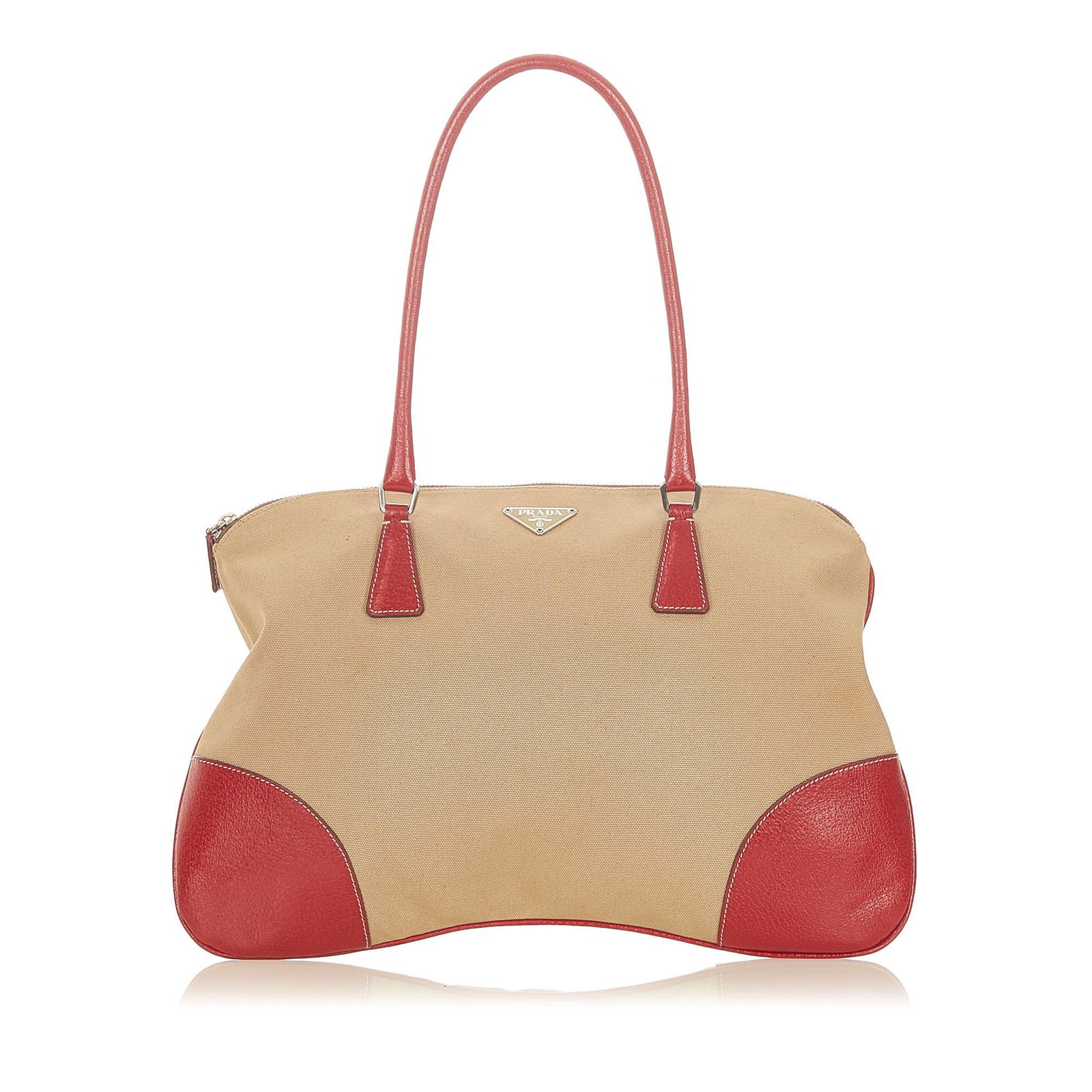 Authentic Prada Canvas Tote Bag: This item qualifies for FREE DOMESTIC SHIPPING to customers in the USA This tote features a canvas body with leather trim rolled handles and a top zip closure. Brand: Prada Model: Canvas Tote Bag Orig