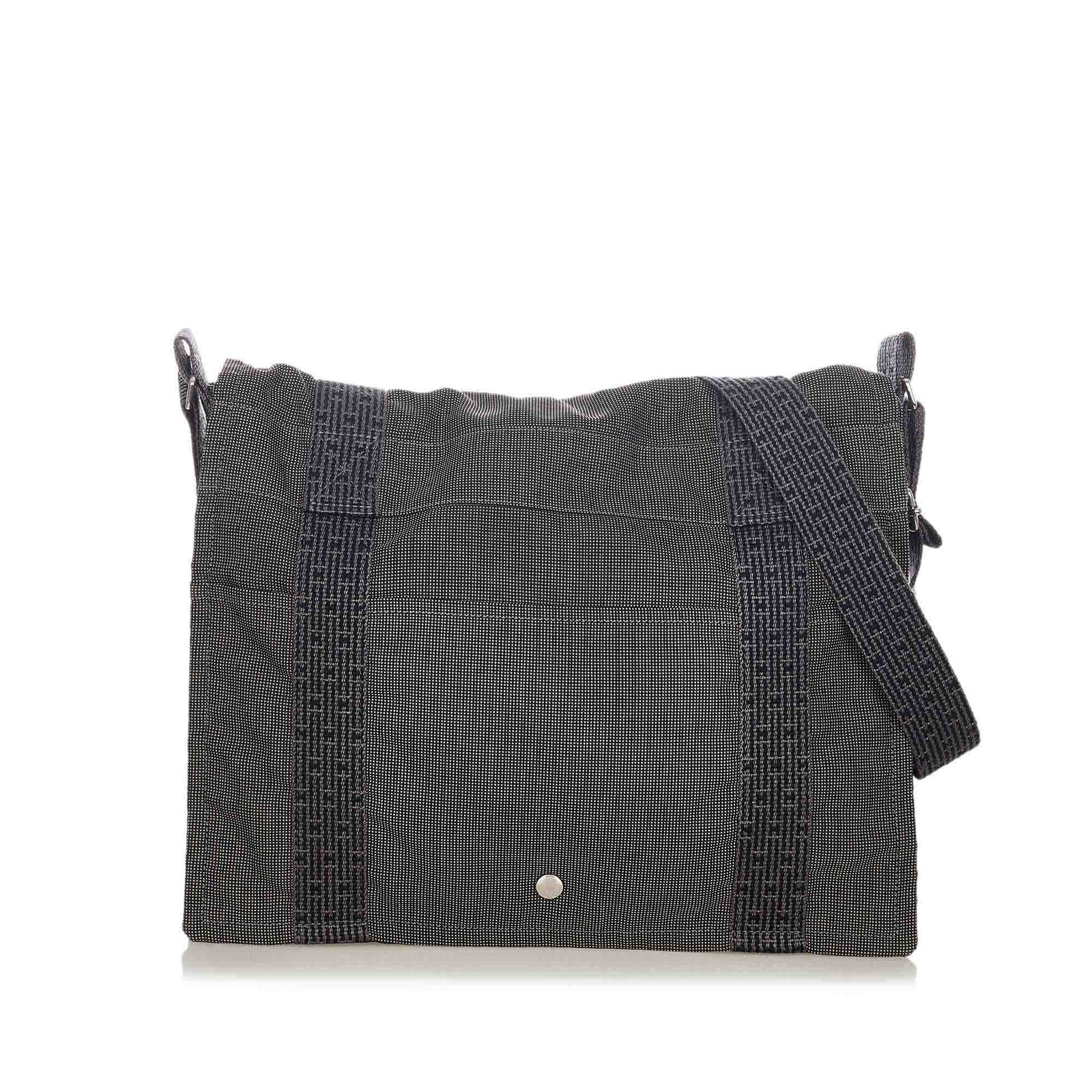 Authentic Hermes Fourre Tout Besace Messenger PM: This item qualifies for FREE DOMESTIC SHIPPING to customers in the USA This crossbody bag features a canvas body a flat strap a front flap with button closure and an interior zip pocket. Brand: Hermes