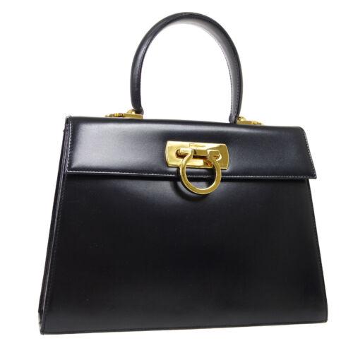 Authentic Salvatore Ferragamo Gancini 2way Hand Bag: This item qualifies for FREE DOMESTIC SHIPPING to customers in the USA Features: 2Way Bag Adjustable Strap Detachable Strap Inner Pockets Model: 2way Hand Handle Style: Double Handles Product Line: Ga