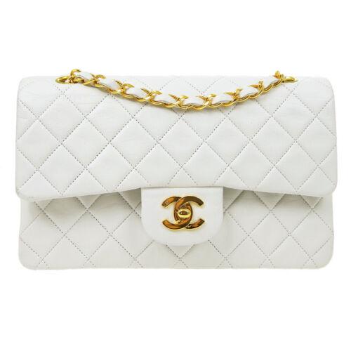 Authentic CHANEL Classic Double Flap Small Chain: This item qualifies for FREE DOMESTIC SHIPPING to customers in the USA Size: Medium Pattern: Matelasse Accents: Quilted Features: Adjustable Strap Certificate of Authenticity Chain Strap Pockets Model