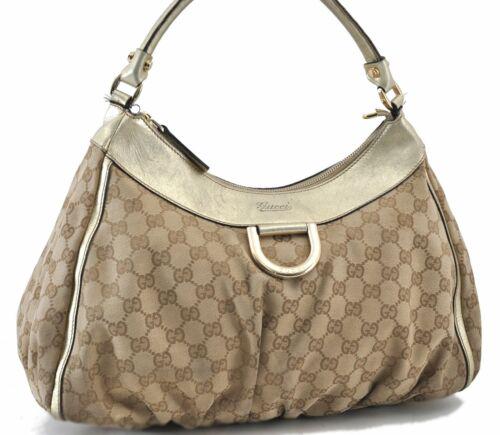 Authentic GUCCI Abbey Hand Bag GG Canvas Leather 189833: This item qualifies for FREE DOMESTIC SHIPPING to customers in the USA Brand: GUCCI Style: Hand Bag Country/Region of Manufacture: Italy Type: Hand Bag Serial Number: 189833492783 Department: Women Ba