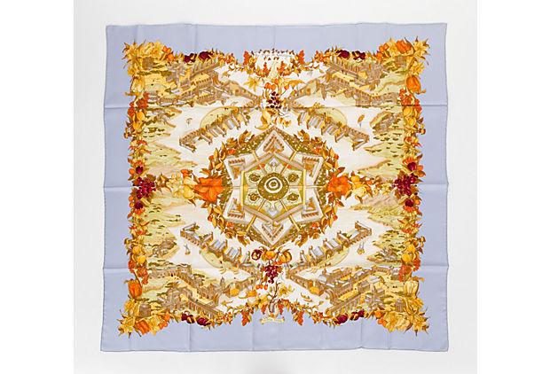 Authentic Hermes "Au Pays De Cocagne" Silk Scarf: This item qualifies for FREE DOMESTIC SHIPPING to customers in the USA Condition: Very Good; minor wear Era: Contemporary; 2000s Dimensions: 35" L x 35" W Materials: silk Color: celeste orange Hermes 