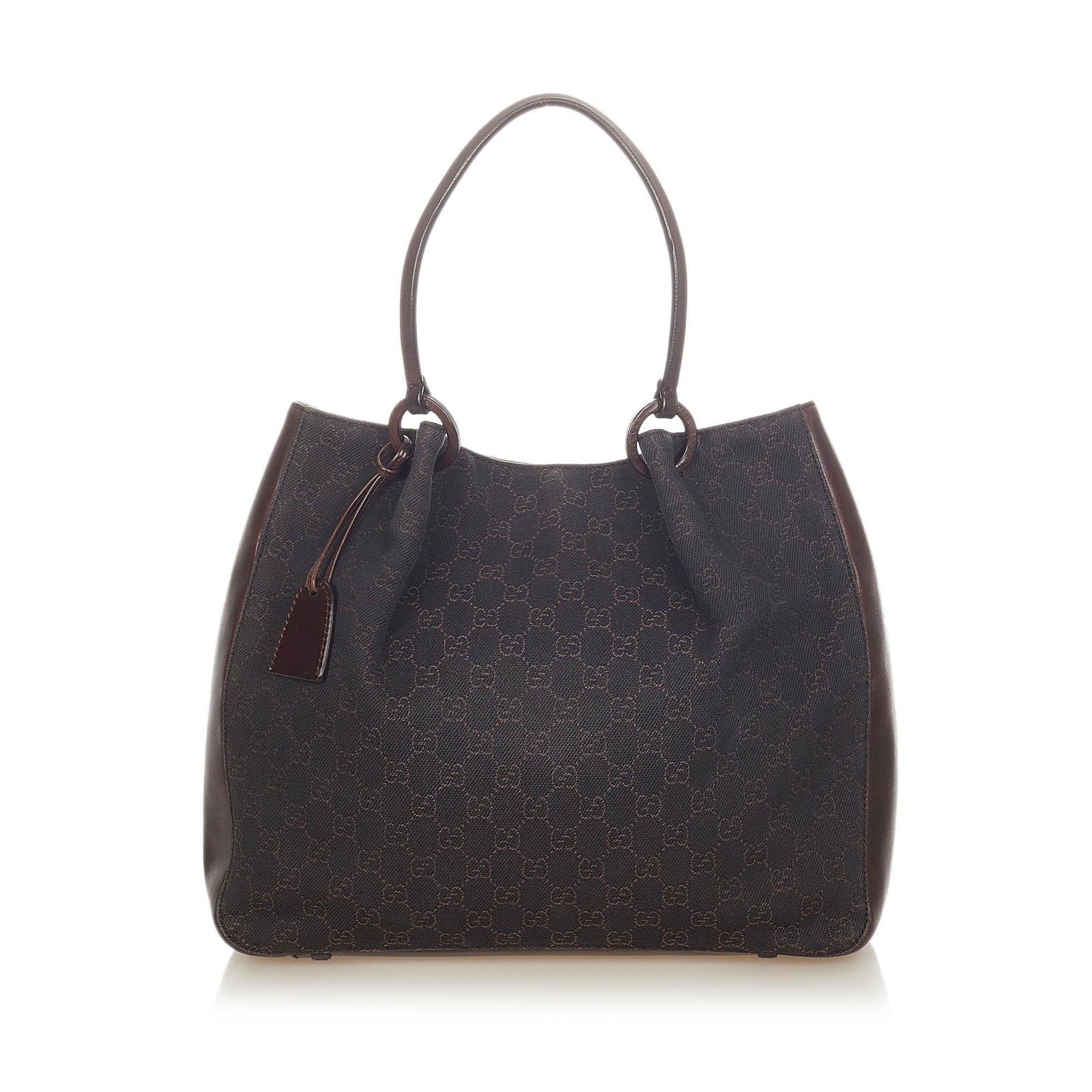 Authentic Gucci GG Canvas Tote Bag: This item qualifies for FREE DOMESTIC SHIPPING to customers in the USA This tote bag features a canvas body with leather trim flat leather straps and an open top with magnetic snap closure. Brand: Guc