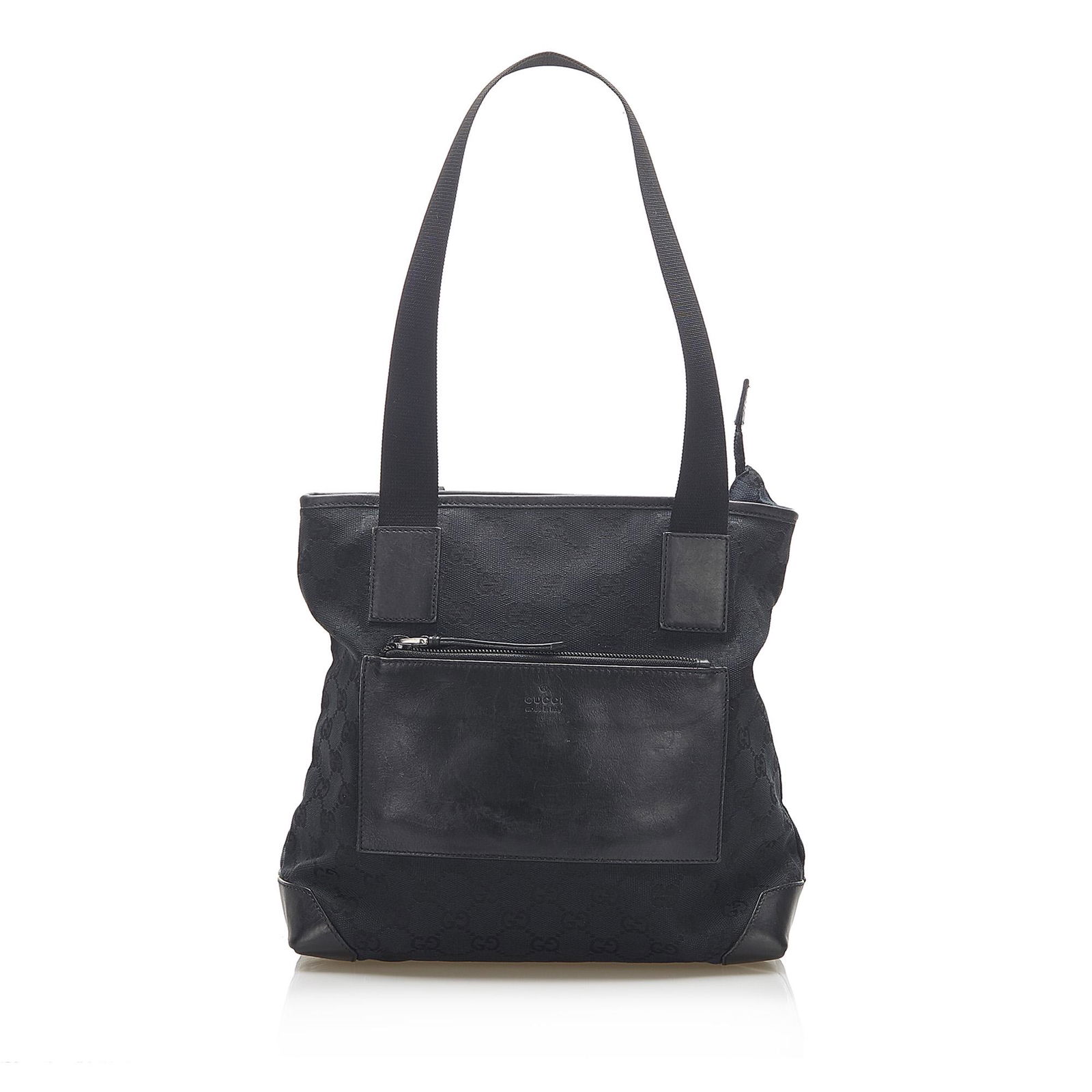 Authentic Gucci GG Canvas Shoulder Bag: This item qualifies for FREE DOMESTIC SHIPPING to customers in the USA This tote bag features a canvas body with leather trim an exterior front zip pocket flat straps and a top zip closure. Brand: Guc