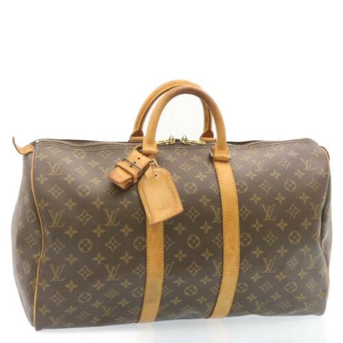 Authentic LOUIS VUITTON Monogram Keepall 45 Boston Bag: This item qualifies for FREE DOMESTIC SHIPPING to customers in the USA Brand: LOUIS VUITTON Department: Women Style: Boston Bag Country of Manufacture: France Material: Monogram Canvas Type: Boston Ba