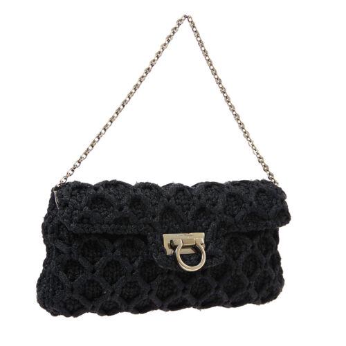 Authentic Salvatore Ferragamo Gancini Braiding Clutch: This item qualifies for FREE DOMESTIC SHIPPING to customers in the USA Size: Small Bag Height: 5.9 Color: Black Product Line: Salvatore Ferragamo Gancini Accents: Buckle Material: Nylon Model: Chain H