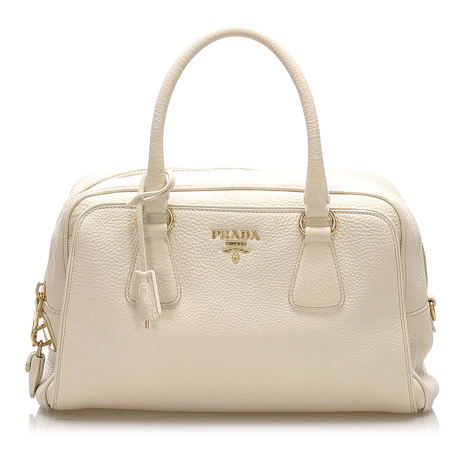 Authentic Prada Vitello Daino Handbag: This item qualifies for FREE DOMESTIC SHIPPING to customers in the USA This handbag features a leather body rolled leather handles an top zip closure and an interior zip compartments. Brand: Prada Mod